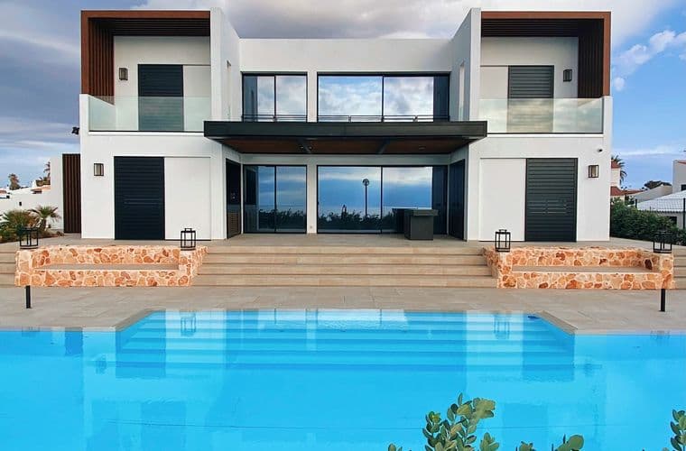 A completed contemporary house with pool and glazed frontage